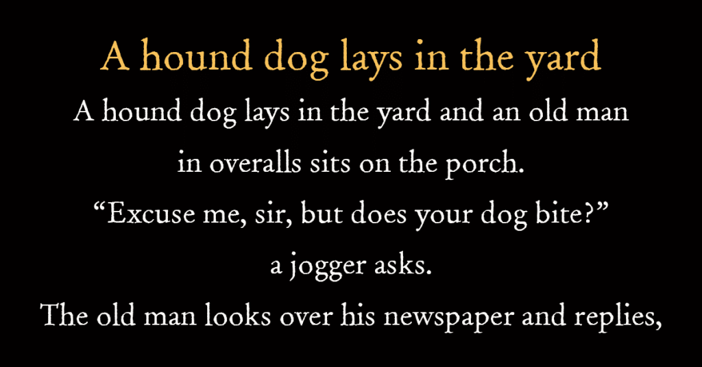 A hound dog lays in the yard