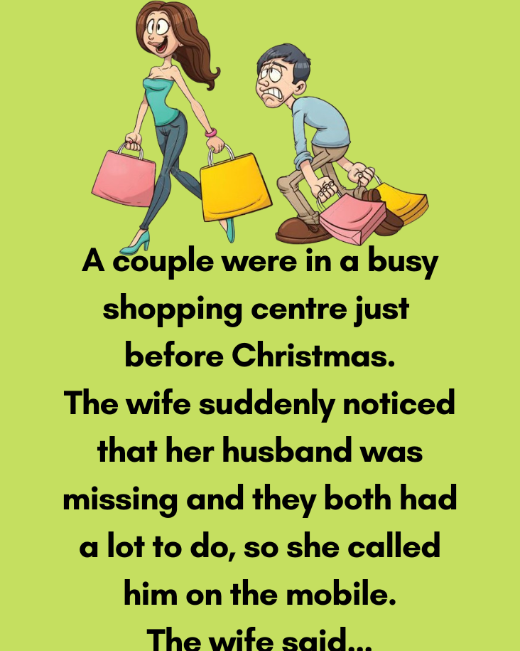 A Couple Were In A Busy Shopping Centre.