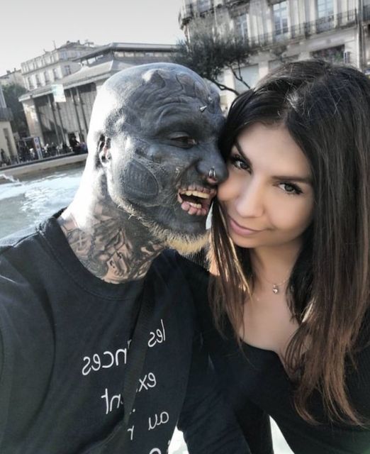 Tattoo fanatic Black Alien introduces new girlfriend as fans pile in with intimate questions…