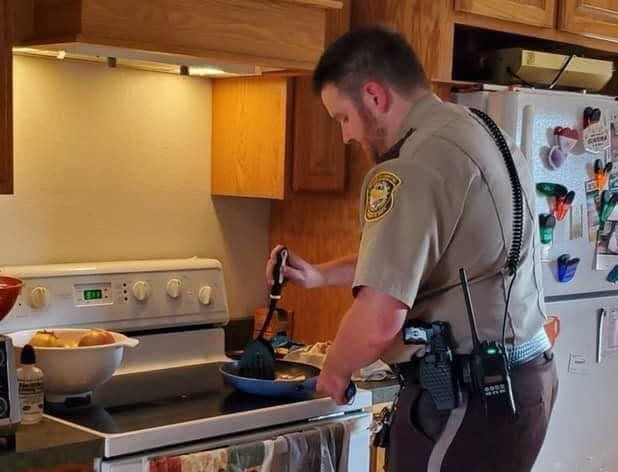 The officer checked on her, and what he discovered convinced him to stay