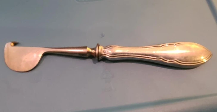 I found this in an old silverware set. It’s a little shorter than a teaspoon, and the bottom edge is not sharp at all.